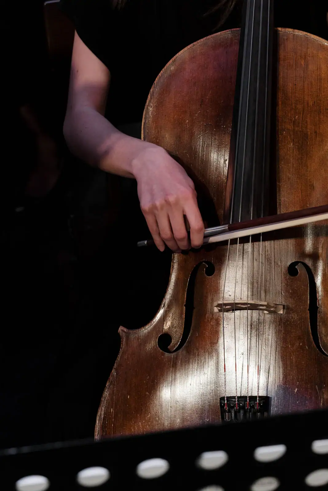 Cellist playing with a bow
